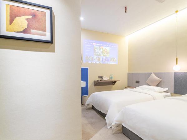 Puzzle Hotel Guangzhou Fenghuang New Village Subway Station : photo 5 de la chambre chambre double deluxe
