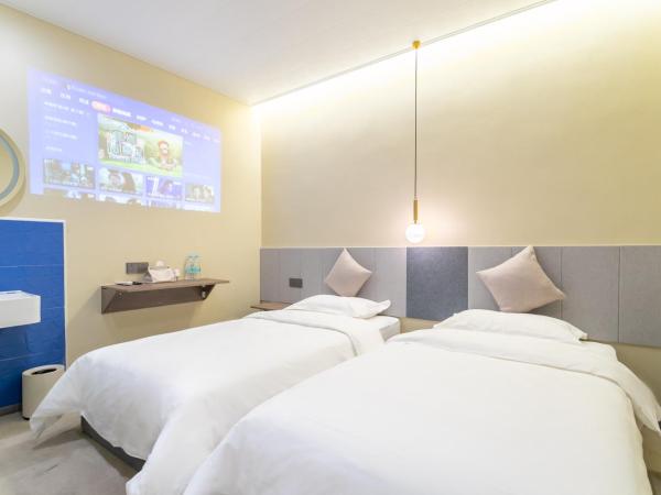 Puzzle Hotel Guangzhou Fenghuang New Village Subway Station : photo 2 de la chambre chambre double avec salle de bains privative