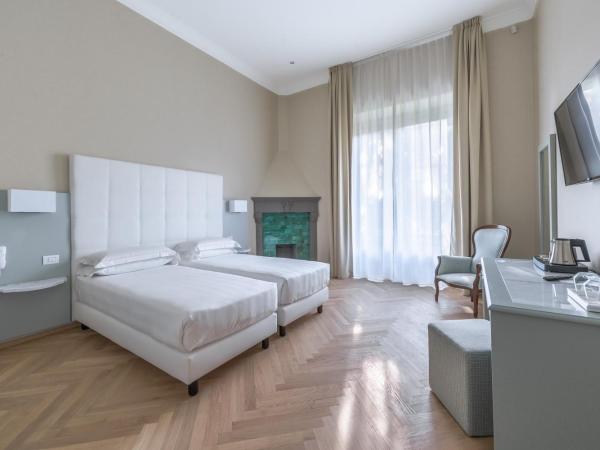 Hotel Ariele : photo 8 de la chambre chambre double ou lits jumeaux supérieure - vue sur jardin