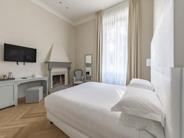 Hotel Ariele : photo 10 de la chambre chambre double ou lits jumeaux supérieure - vue sur jardin