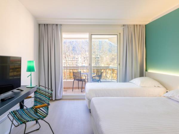 Hôtel Riva Art & Spa : photo 1 de la chambre chambre triple avec terrasse - vue sur montagne