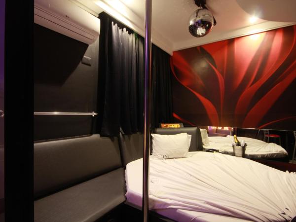 Lina Motel Tatuapé : photo 9 de la chambre suite lit queen-size avec baignoire spa