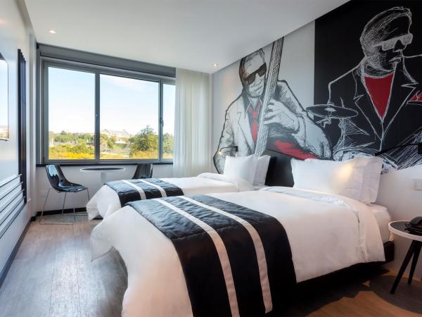 HF Fenix Music : photo 2 de la chambre chambre lits jumeaux harmony