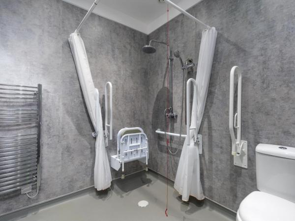 SMITH PLACE HOTEL : photo 10 de la chambre chambre familiale avec salle de bains