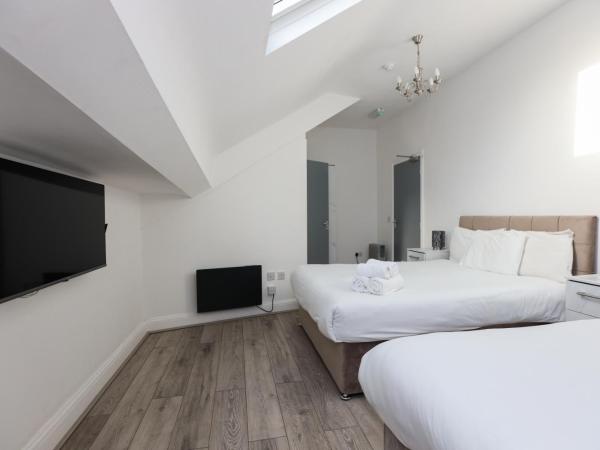 Hotel Anfield : photo 2 de la chambre chambre quadruple avec salle de bains privative