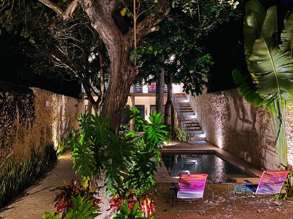 Hotelito YUM KAAX : photo 5 de la chambre suite lit queen-size - vue sur piscine