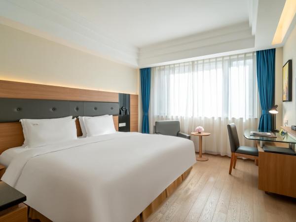 Holiday Inn Shanghai Hongqiao Central, an IHG Hotel : photo 1 de la chambre chambre lit king-size standard - Étage supérieur