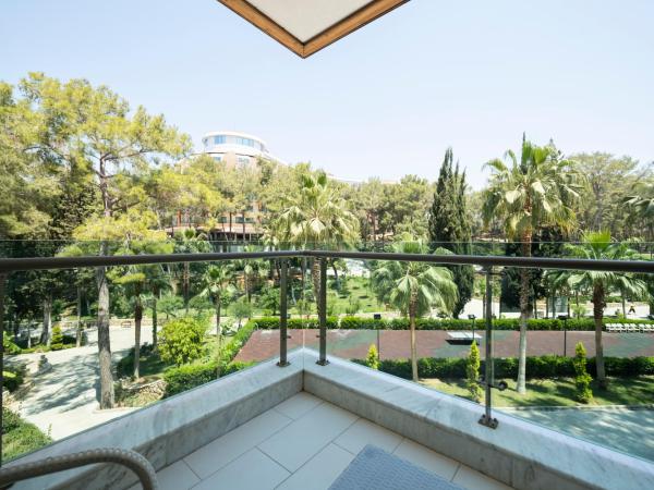 Wome Prime Hotel - Halal All Inclusive : photo 5 de la chambre chambre quadruple - vue sur jardin