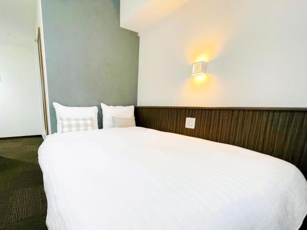 Eins.Inn Umeda Higashi : photo 1 de la chambre chambre double avec petit lit double - réservée aux femmes - non-fumeurs