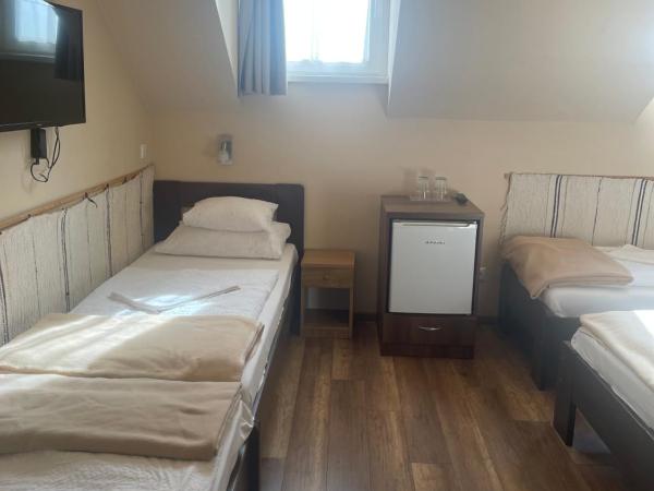 Kastélykert Fogadó : photo 4 de la chambre chambre quadruple Économique