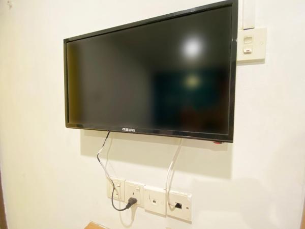 Hotel 91 Taman Daya : photo 3 de la chambre chambre lits jumeaux avec salle de bains