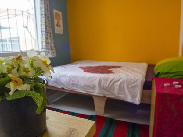 Shantihome : photo 10 de la chambre chambre double avec salle de bains commune