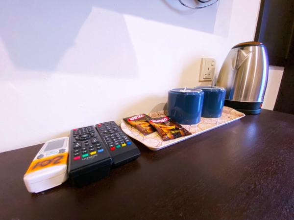 Ze Xiang Hotel - Desa Jaya Ikea Self Check in : photo 5 de la chambre chambre lits jumeaux avec salle de bains