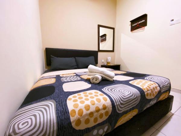 Ze Xiang Hotel - Desa Jaya Ikea Self Check in : photo 2 de la chambre chambre double Économique