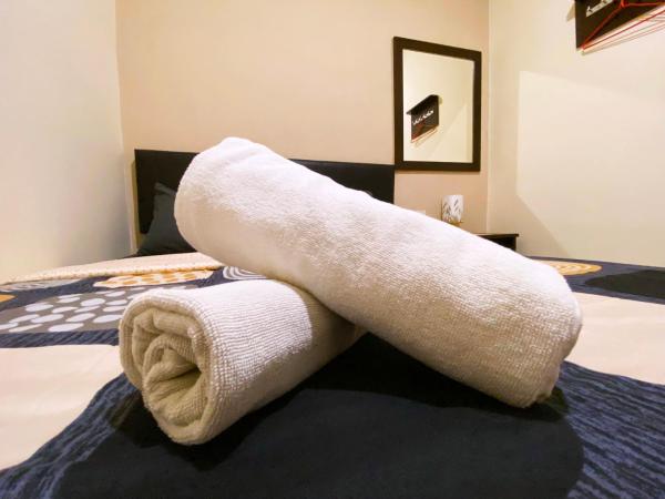 Ze Xiang Hotel - Desa Jaya Ikea Self Check in : photo 4 de la chambre chambre double Économique