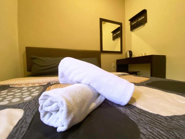 Ze Xiang Hotel - Desa Jaya Ikea Self Check in : photo 3 de la chambre chambre standard lit queen-size