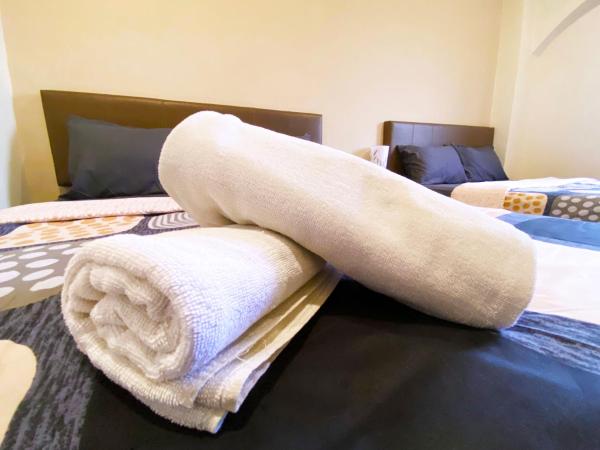 Ze Xiang Hotel - Desa Jaya Ikea Self Check in : photo 5 de la chambre chambre familiale