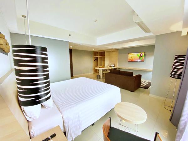 Harper MT Haryono by ASTON : photo 3 de la chambre suite junior