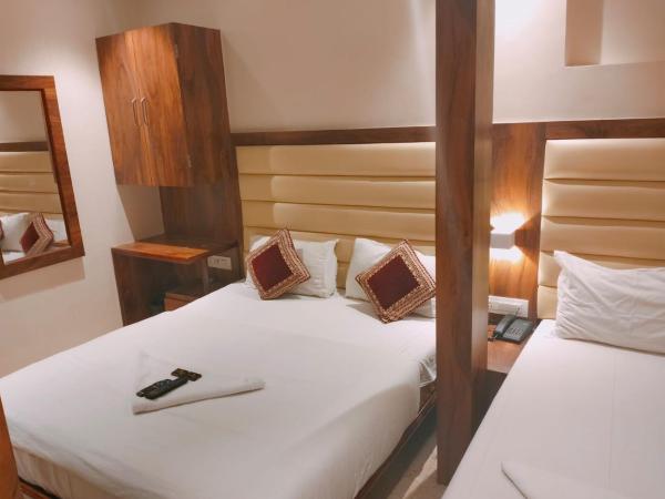Hotel Adams Inn Near Mumbai Airport : photo 9 de la chambre chambre triple classique