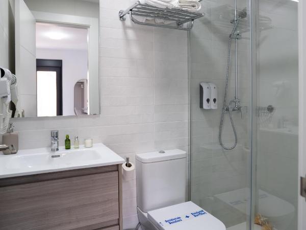 Stay Belonio : photo 5 de la chambre chambre triple avec balcon