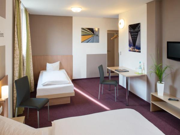 Hotel Mainstation : photo 4 de la chambre chambre triple