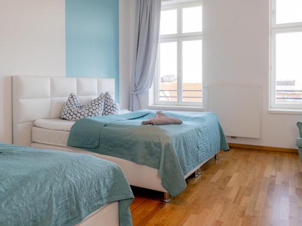 Luga Homes - Stadthaus : photo 7 de la chambre quadruple room 