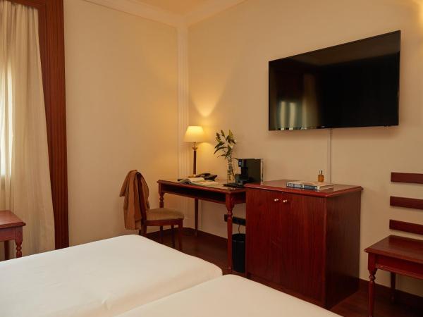 El Avenida Palace : photo 2 de la chambre hébergement familial avec 2 chambres communicantes