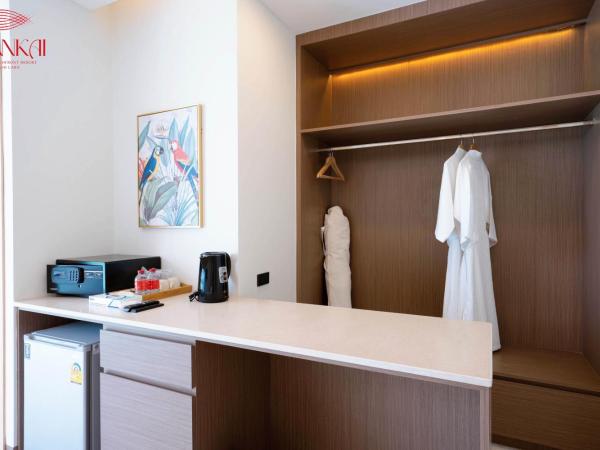 ENNKAI Beachfront Resort Koh Larn : photo 2 de la chambre chambre lit king-size deluxe