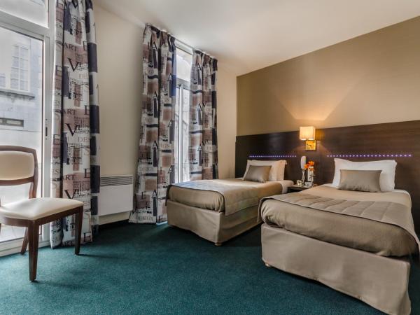 Hôtel Croix des Bretons - Lourdes Pyrénées : photo 3 de la chambre chambre lits jumeaux