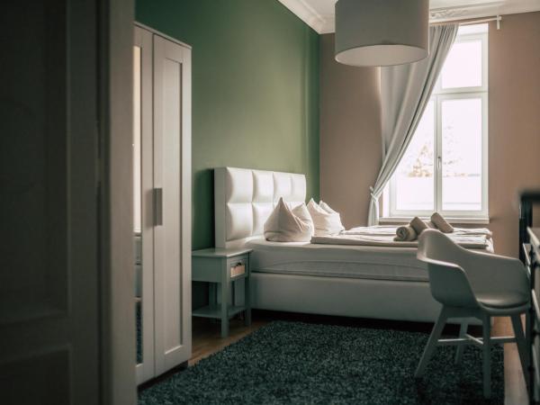 Luga Homes - Stadthaus : photo 9 de la chambre large three-bedroom apartment 