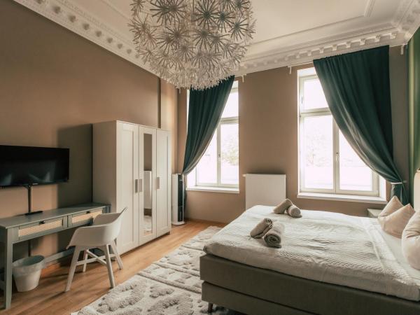 Luga Homes - Stadthaus : photo 2 de la chambre large three-bedroom apartment 