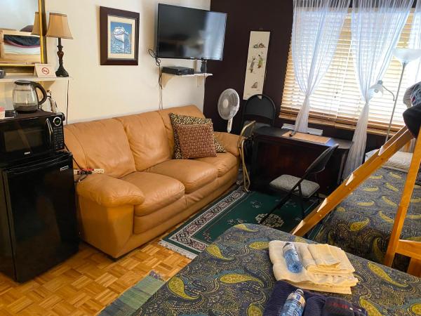 Repos & Manna Downtown Montréal : photo 2 de la chambre chambre double avec lit superposé