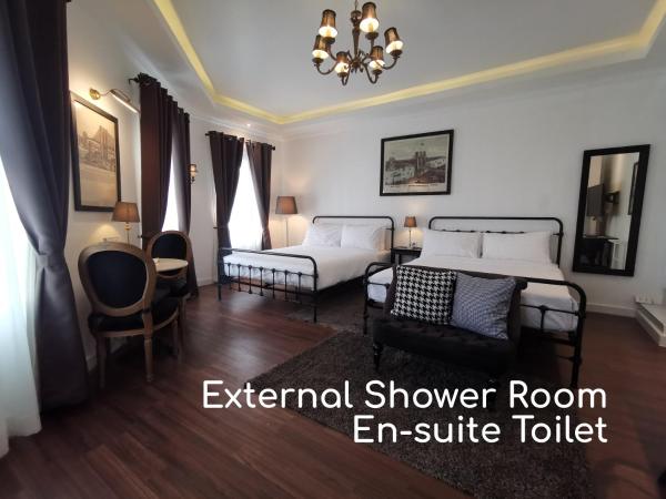 Double Bed Hotel : photo 1 de la chambre chambre lits jumeaux avec salle de bains privative séparée