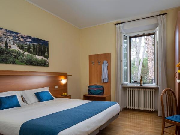 Hotel Sacro Cuore : photo 1 de la chambre chambre familiale supérieure