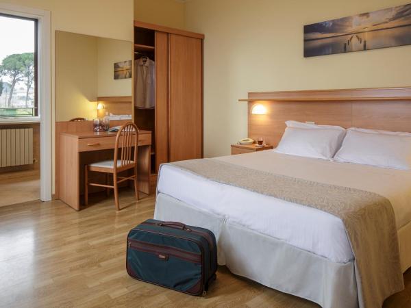 Hotel Sacro Cuore : photo 1 de la chambre chambre triple supérieure