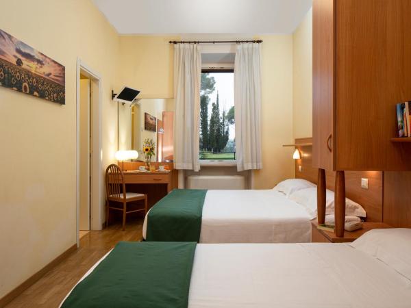 Hotel Sacro Cuore : photo 9 de la chambre chambre triple supérieure