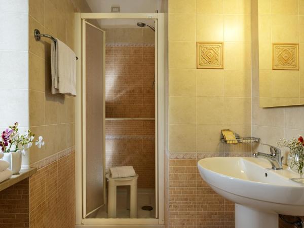 Hotel Sacro Cuore : photo 4 de la chambre chambre triple supérieure