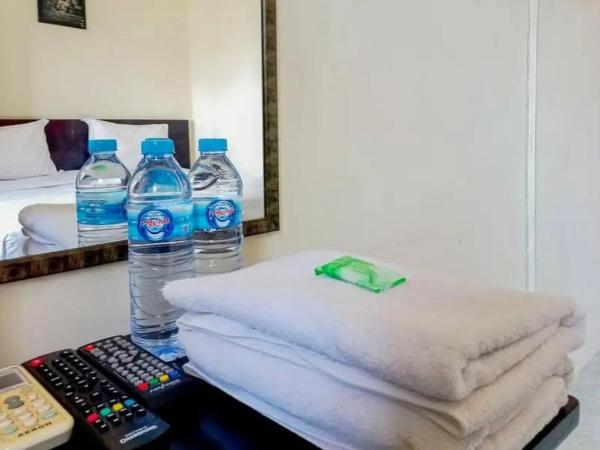 Graha Ara Homestay Syariah RSUD Dr Soetomo Surabaya Mitra RedDoorz : photo 6 de la chambre chambre double Économique