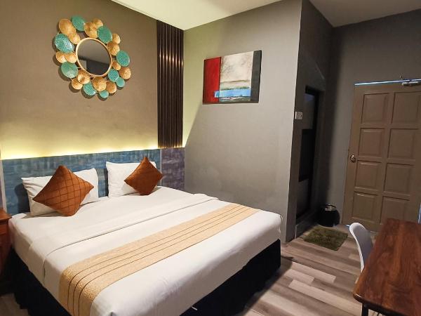 Tc theme park Guest house : photo 1 de la chambre chambre double deluxe avec balcon