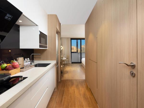 Eature Residences Lingang : photo 2 de la chambre chambre lit king-size supérieure