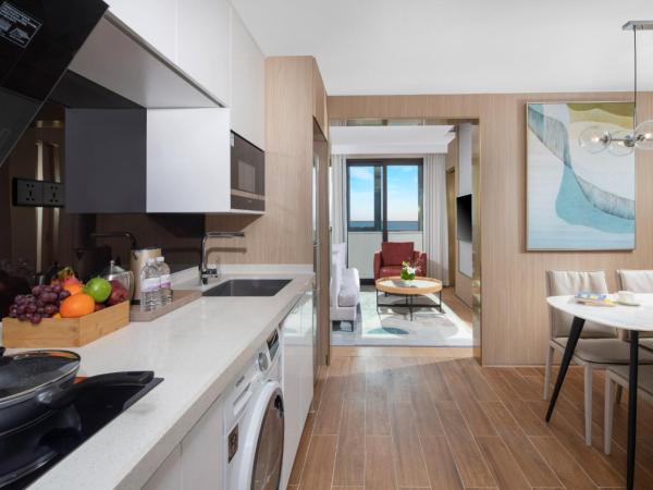 Eature Residences Lingang : photo 3 de la chambre deluxe studio king with living & dining room(northward)