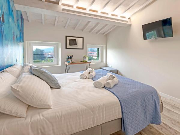 Evaluna Homevacation : photo 4 de la chambre grande chambre double