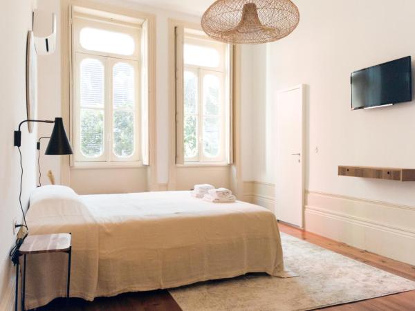 Alameda Suites - River Guest House : photo 4 de la chambre chambre triple