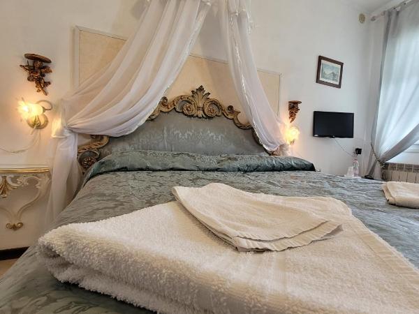 Cà Isabella : photo 8 de la chambre chambre lit king-size - vue sur mer