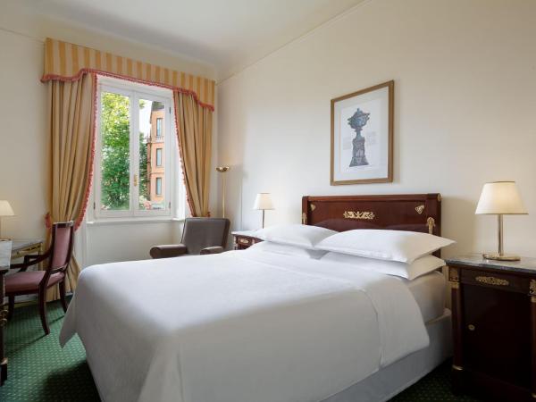 Sheraton Diana Majestic : photo 3 de la chambre grande chambre lit king-size de luxe avec vue sur le jardin