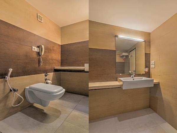 Treebo Premium Metropolis : photo 6 de la chambre chambre double deluxe