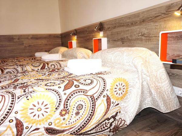 MuchoMadrid : photo 6 de la chambre  lit dans dortoir mixte de 4 lits avec salle de bains commune