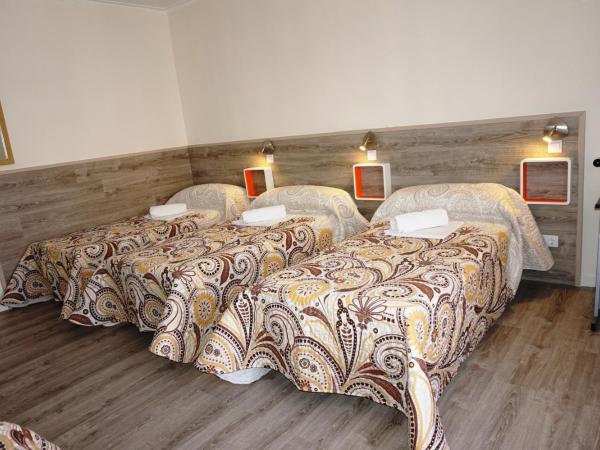 MuchoMadrid : photo 7 de la chambre  lit dans dortoir mixte de 4 lits avec salle de bains commune