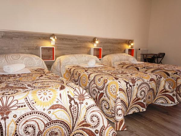 MuchoMadrid : photo 3 de la chambre  lit dans dortoir mixte de 4 lits avec salle de bains commune