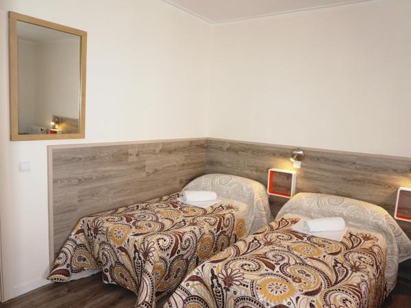 MuchoMadrid : photo 4 de la chambre  lit dans dortoir mixte de 4 lits avec salle de bains commune